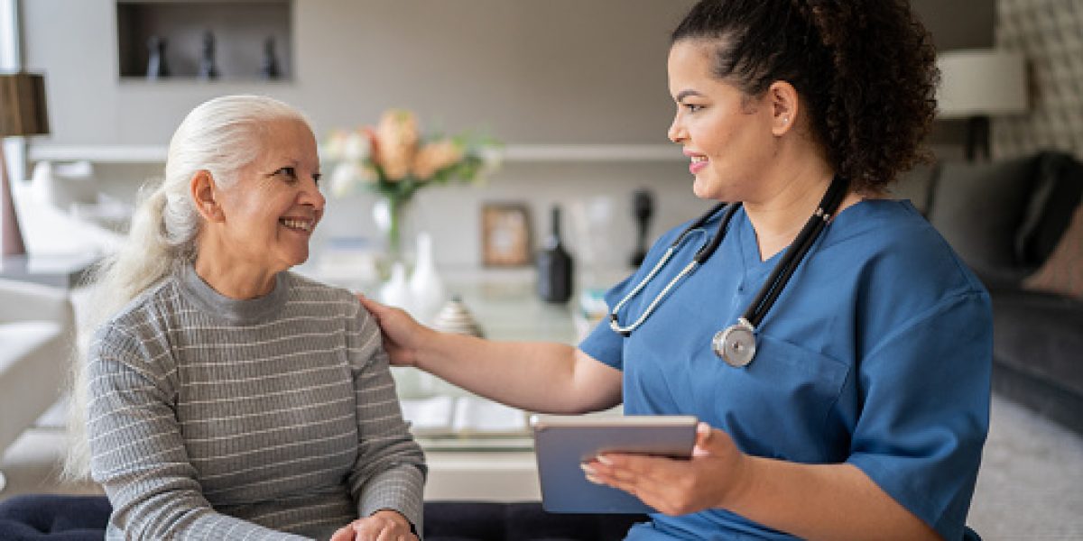 A Nurse Converses with an Elderly Woman, Promoting Healthy Motivation Tips in Jackson, TN.